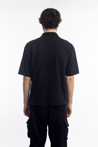 Remera polo negro